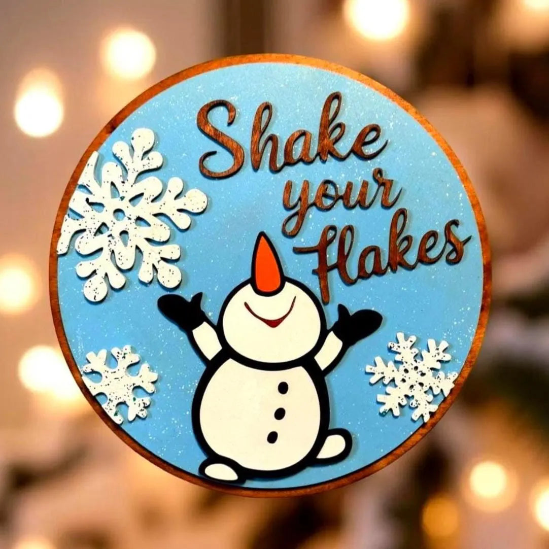 Shake Your Flakes Winter Sign – Round Wooden Snowman Decor – Layered Snowflake Door Hanger