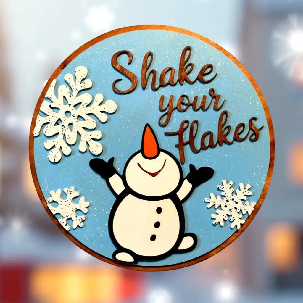 Shake Your Flakes Winter Sign – Round Wooden Snowman Decor – Layered Snowflake Door Hanger