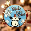 Shake Your Flakes Winter Sign – Round Wooden Snowman Decor – Layered Snowflake Door Hanger