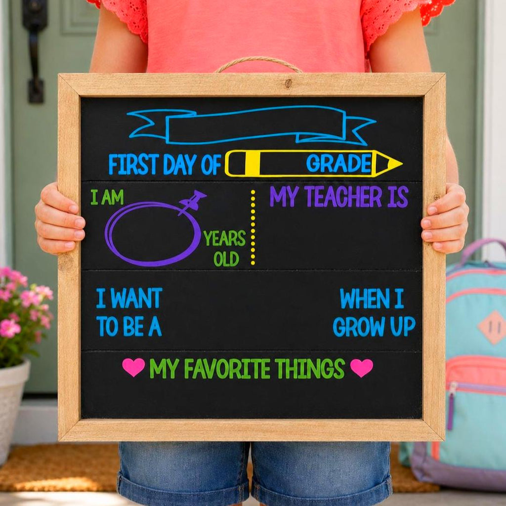 Child holding a blank 16x16 first-day-of-school chalkboard sign with spaces for name, grade, teacher, age, career and favorite things.